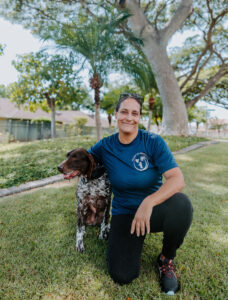 Trainer Maria with her trained dog