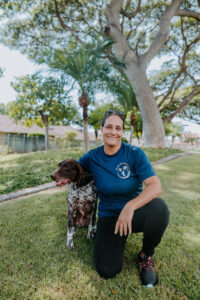Trainer Maria with her trained dog